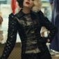 Actress Emma Stone Wearing Black Jacket In Cruella Movie