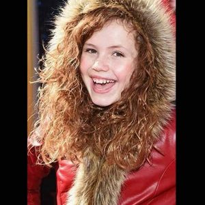 Darby Camp Wearing Red Coat In The Christmas Chronicles 2 Premiere